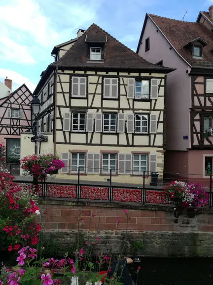 Folklore dancing in the evening at Colmar, Alsace (France)